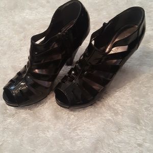 Caged patent leather bootie